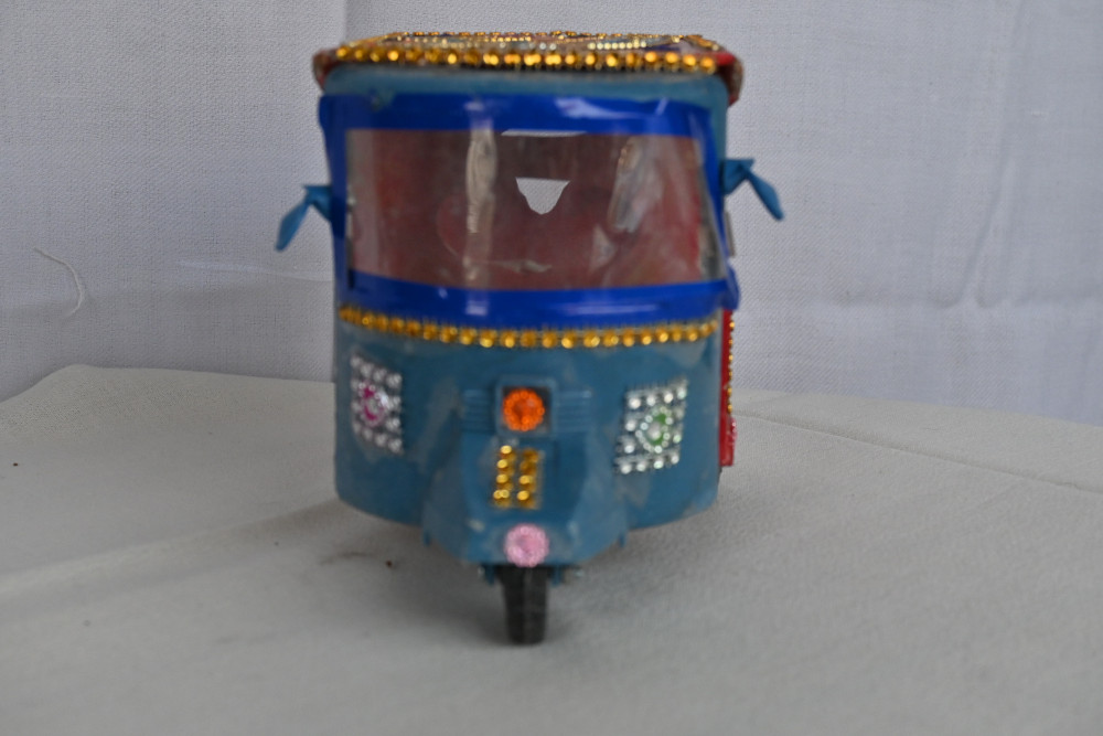 Raksha wooden truck Art