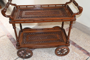 Wooden tea trolley with cut work